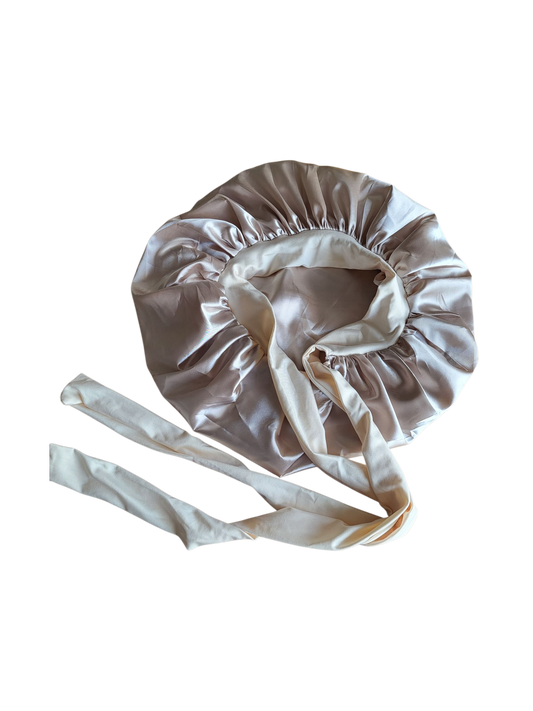 Bonnet met strik champagne