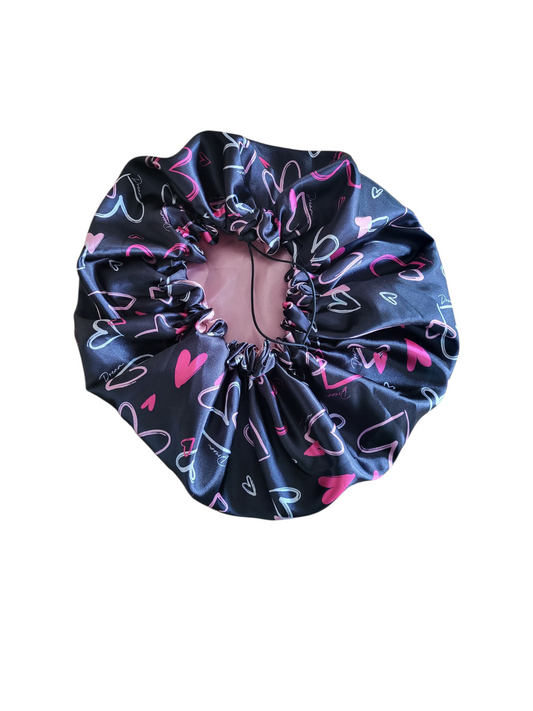 Bonnet roze hartjes met roze